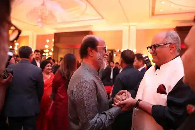 Boney Kapoor and Rajinikanth share a light moment.