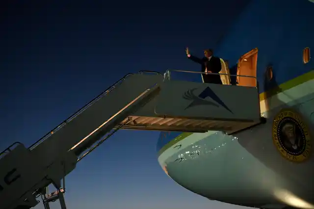 President Donald Trump walks down the steps of Air Force One at El Paso International Airport in El Paso, Texas, Monday, 11 February 2019.