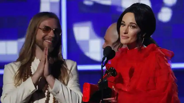 Kacey Musgraves accepts her Grammy award.