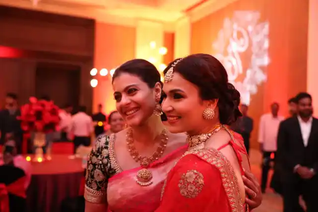 Kajol poses with her director. She had acted in the Tamil film Velaiilla Pattadhari 2 or VIP 2 (2017) which was directed by Soundarya.
