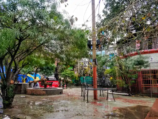 In this market there were makeshift shops, all set ablaze. Today there stands some benches and a temple.