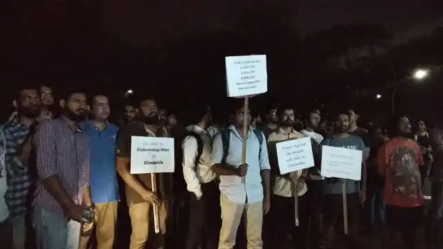 Research scholars protest the hike announced by the Department of Science and Technology.