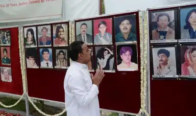 New Delhi: Relatives of Uphaar Cinema fire victims during a programme organised to pay tribute to them on the 20th anniversary of the accident in New Delhi, on June 13, 2016. (Photo: IANS)
