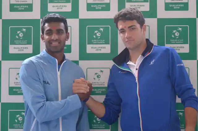 India’s top ranked player Prajnesh Gunneswaran with Italy’s Matteo Berrettini ahead of their tie.