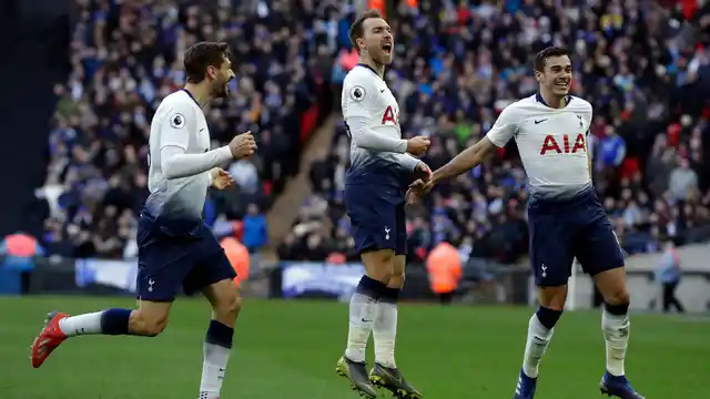 Tottenham Hotspur’s Christian Eriksen (centre) celebrates after scoring his side’s second goal during the English Premier League match against Leicester City at Wembley stadium on Sunday.