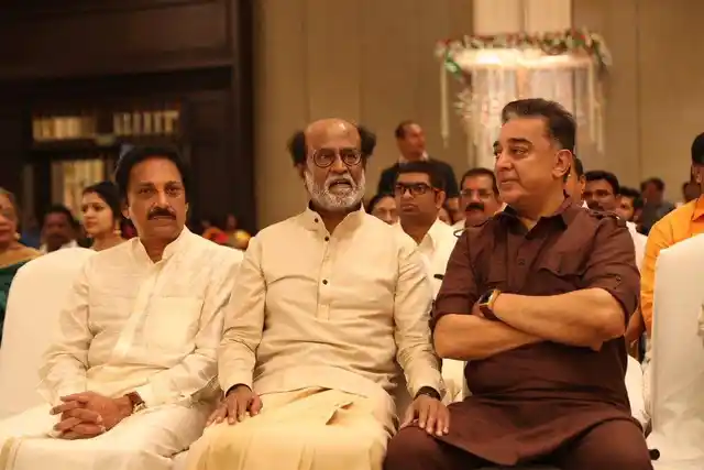 Rajinikanth with Kamal Haasan (R) and brother-in-law Ravi Raghavendra (L)