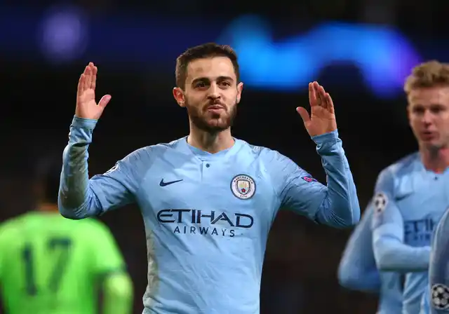 Manchester City’s Bernardo Silva celebrates after scoring his side’s fifth goal during the Champions League round of 16 second leg, soccer match between Manchester City and Schalke 04 at Etihad stadium in Manchester, England, Tuesday, March 12, 2019. 