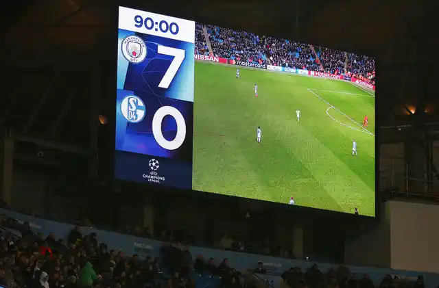 The stadium screen displays the result at the end of the Champions League round of 16 second leg, soccer match between Manchester City and Schalke 04 at Etihad stadium in Manchester, England, Tuesday, March 12, 2019.