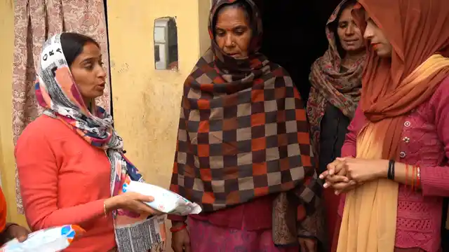 These women go door-to-door selling pads and explaining women the benefits of using them.