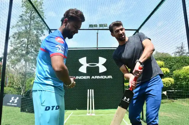 Rishabh Pant with the most successful Olympian Michael Phelps.