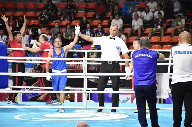 Indian boxer Amit Panghal after defeating Uzbekistan’s Hasanboy Dusmatov in the quarter final match of the Asian Boxing Championships in Bangkok on April 22, 2019. 
