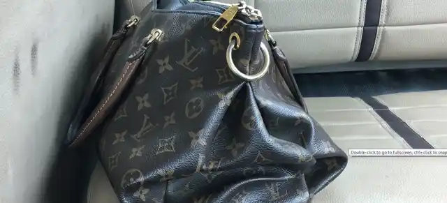 Inspite of my attempts at keeping this interview strictly feminist, I couldn’t help sneak a picture of the famed Louis Vuitton bag which sat pretty in the back seat of her car.