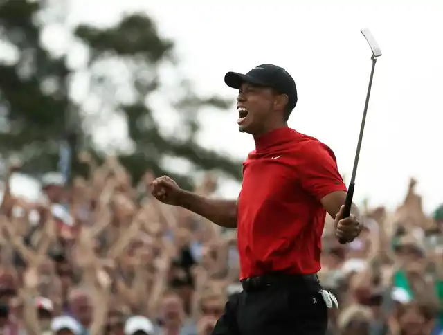 Tiger Woods reacts as he wins the Masters golf tournament Sunday, April 14, 2019, in Augusta, Ga.