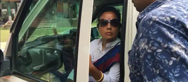 Mahua waits in the car while mobilising her cadre.