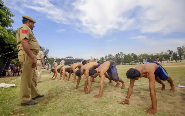 Candidates during a physical fitness test for the post of Special Police Officers (SPO), at Gulshan Ground in Jammu, on 7 May.