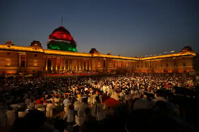 Guests watch the swearing-in ceremony of Narendra Modi, who took oath for a second term as India’s prime minister at the forecourt of the Rashtrapati Bhavan in New Delhi. 