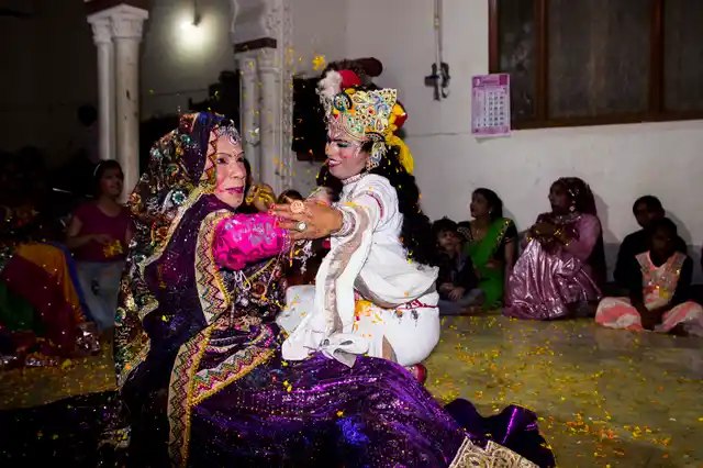 A local ‘Huranga’ celebration of Holi where all male members dress up as Krishna, Radha and Gopis to perform the Raas in local neighbourhood, just one night before Holi. 