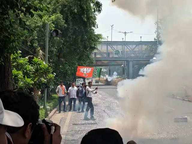 Supporters took to the road outside the BJP HQ to celebrate