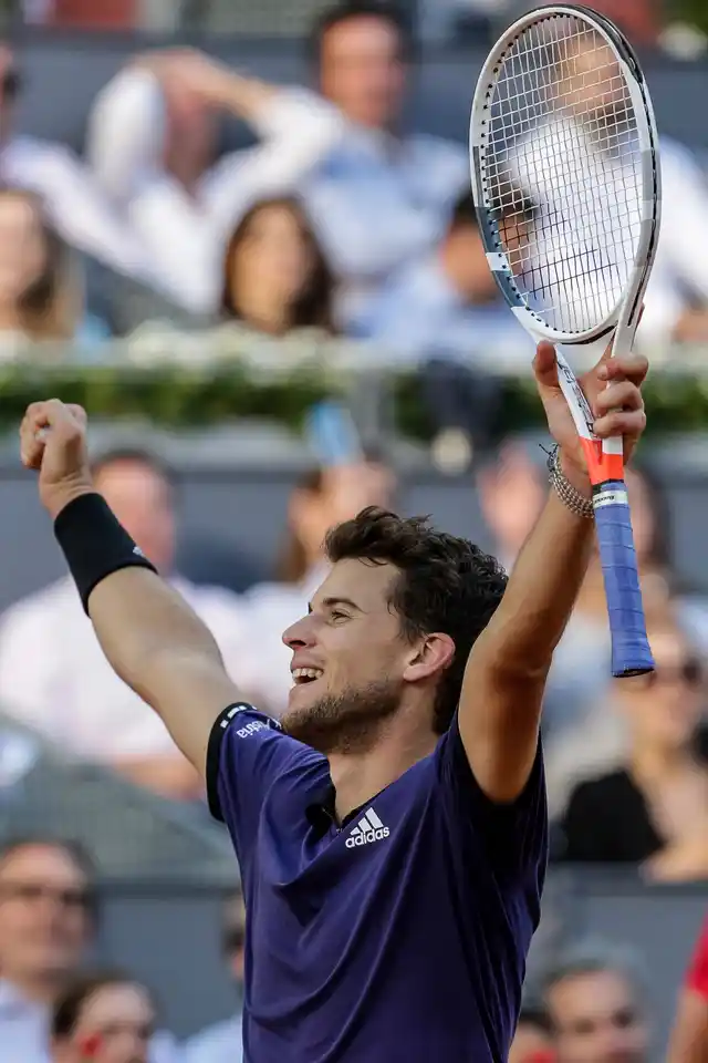 Austria’s Dominic Thiem celebrates his victory against Roger Federer in the Madrid Open.