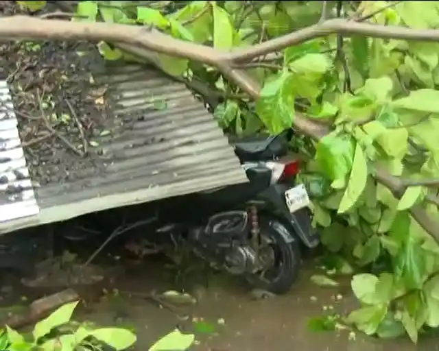 A roof collapsed over a bike in Bhubaneswar. 