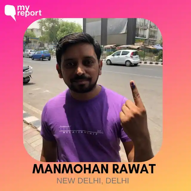 Manmohan Rawat flaunts his inked finger.