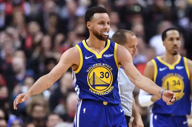 Golden State Warriors guard Stephen Curry (30) reacts during second half basketball action against the Toronto Raptors in Game 1 of the NBA Finals in Toronto on Thursday, May 30, 2019. 