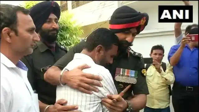 Family of Major Ketan Sharma mourns his demise, at their residence in Kanker Khera.