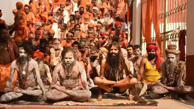 Sadhus perform yoga at Kamakhya Temple to mark the 5th International Day of Yoga, in Guwahati, Friday, 21 June, 2019.