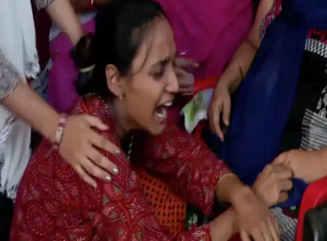 Family of Major Ketan Sharma mourns his demise, at their residence in Kanker Khera.