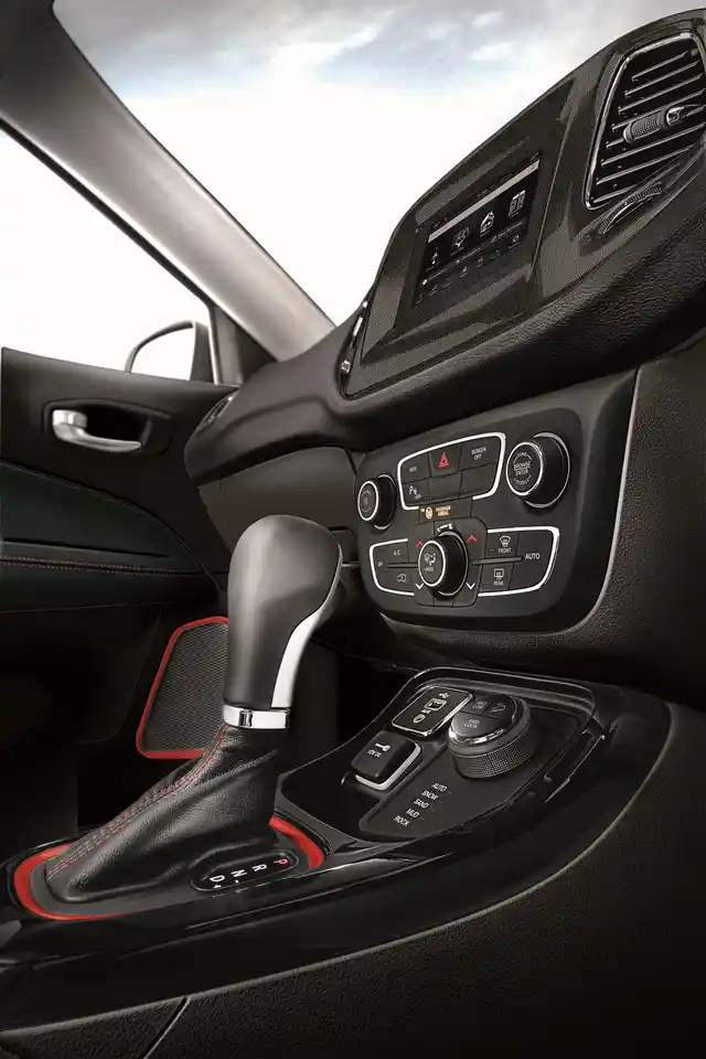 The Jeep Compass gets an additional “Rock Mode” and 4x4 low range. 
