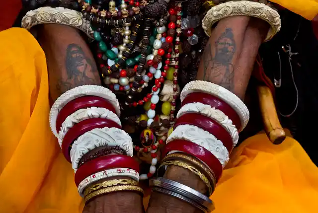 In this photo, a sadhvi sits with her hands tattooed with images of Hindu god Shiva during Ambubachi festival at the Kamakhya temple in Guwahati.