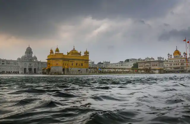 Rain clouds hover over Harmandir Sahib (Golden Temple) before the onset of monsoon, in Amritsar on Thursday, 4 July.