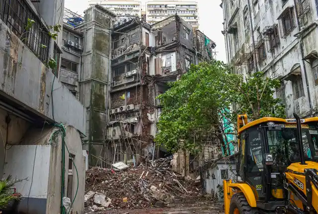 A part of the 71-year-old Nusser building behind the Royal Opera House which collapsed following incessant monsoon rains, in Mumbai.