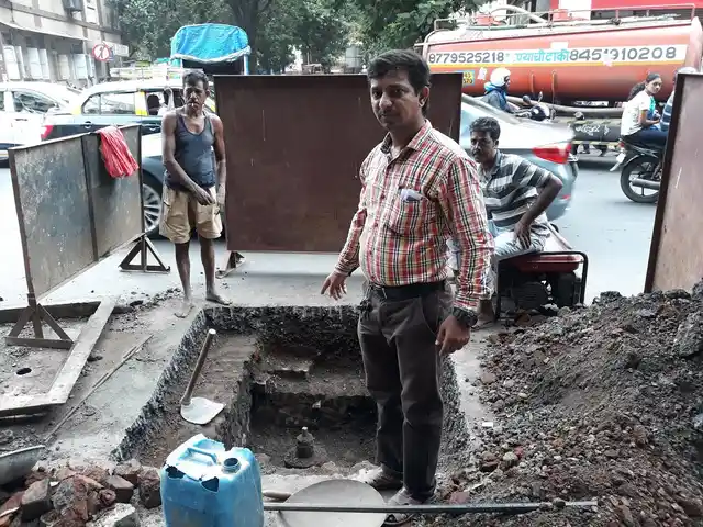 Work in progress to repair a broken water pipe at Mahim west, Mori Road. 