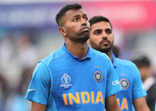 India’s Hardik Pandya, left, reacts after their loss in the Cricket World Cup semi-final match against New Zealand at Old Trafford in Manchester, England, Wednesday, July 10, 2019.