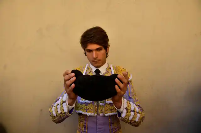 French bullfighter, Sebastin Castella, holds his ‘’montera’’ before to entering in the bullring at the San Fermin Festival.