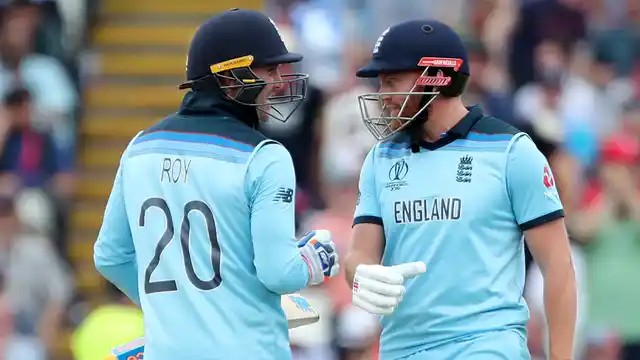England’s Jason Roy, left, celebrates with batting partner Jonny Bairstow after hitting a boundary during the Cricket World Cup semi-final match between England and Australia at Edgbaston in Birmingham, England, Thursday, July 11, 2019.