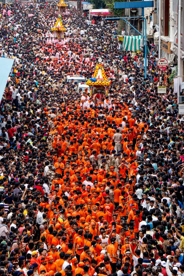 Devotees pull the ‘rath’ or the chariot of Lord Jagannath during the annual Rath Yatra, in Ahmedabad on Thursday, 4 July.