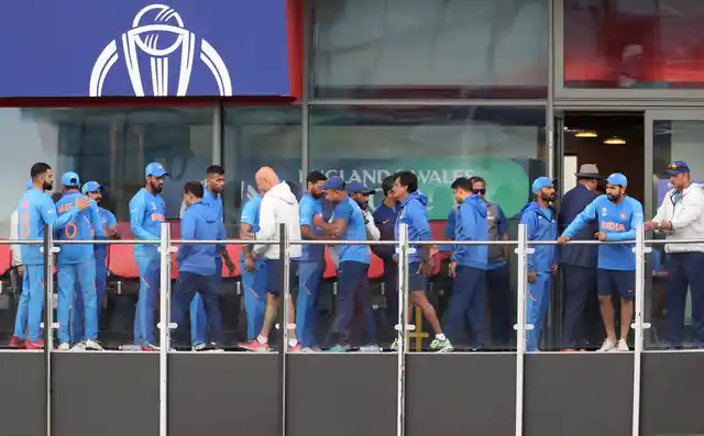 Indian cricketers react after their team lost the Cricket World Cup semifinal match between India and New Zealand at Old Trafford in Manchester, Wednesday, July 10, 2019. 