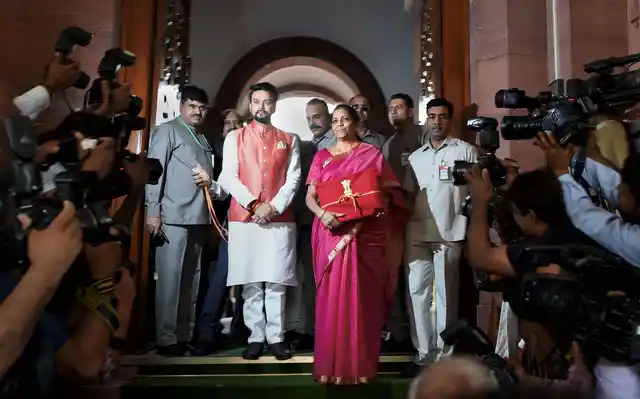 Finance Minister Nirmala Sitharaman and MoS Anurag Thakur arrive at Parliament to present the Union Budget 2019-20 on Friday, 5 July. 