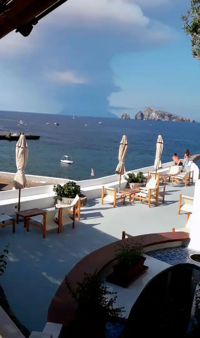 Around 30 tourists were forced to jump into the sea for safety.