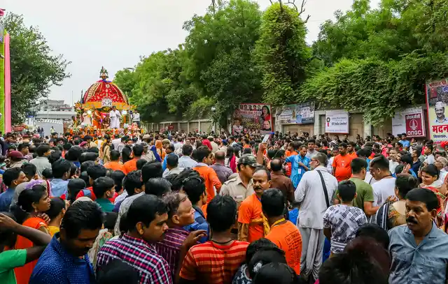 Devotees pull the chariot of Lord Jagannath during the Rath Yatra, in New Delhi, Thursday.