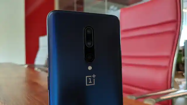 Vertical triple rear camera setup on the OnePlus 7 Pro.