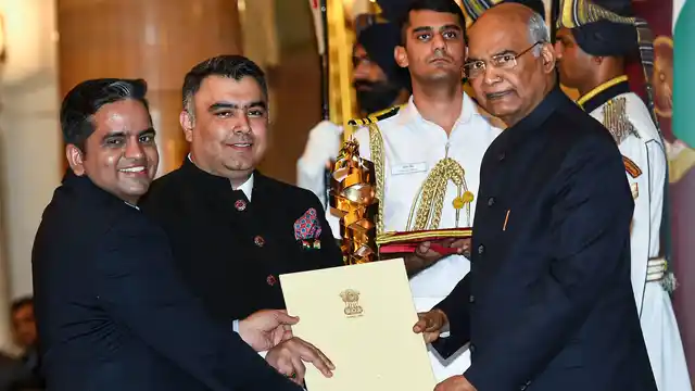 President Ram Nath Kovind presents Rashtriya Khel Protsahan Puruskar 2019 to Gagan Narang and Pawan Singh (L) representing Gagan Narang Sports Promotion Foundation.
