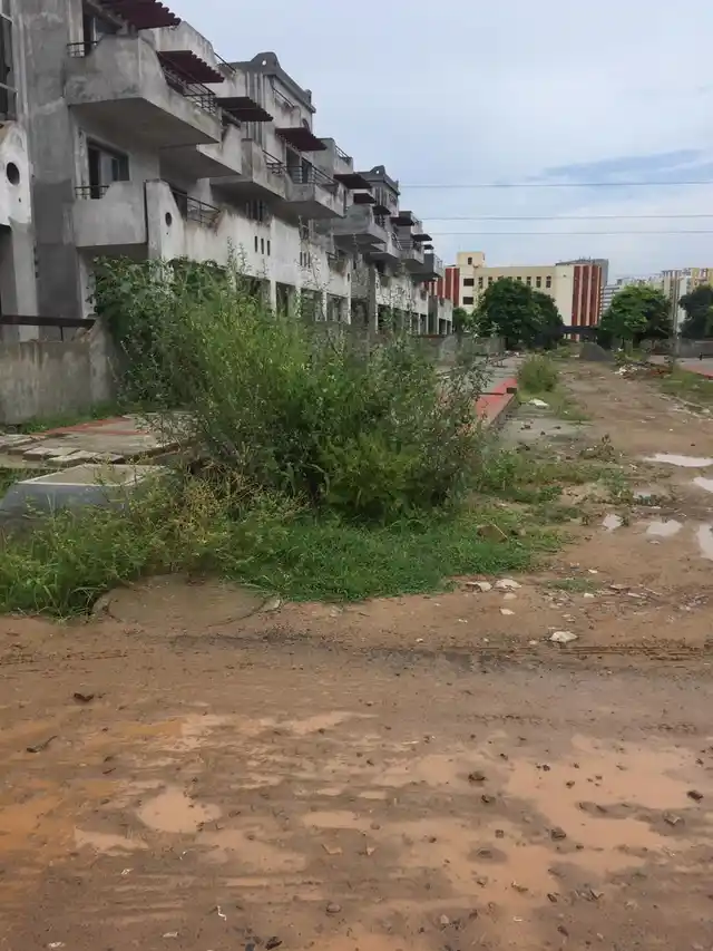 Under construction buildings lay abandoned at the site. 