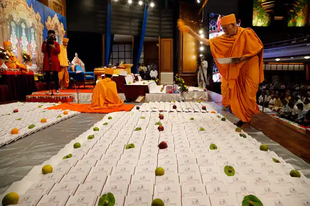Traders and Devotees of Swami Narayan sect Performing Chopda (Book) pooja on the day of Laxmi Pujan in Mumbai.