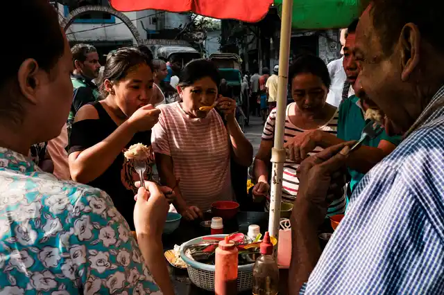 Chinese people of Indian origin have their breakfast at a market in Kolkata, India, Sunday, 20 Oct 2019.