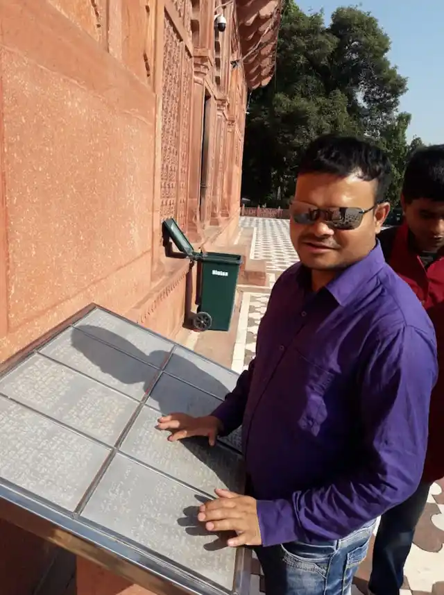 A Braille inscription made from a steel plate outside Taj Mahal Museum.