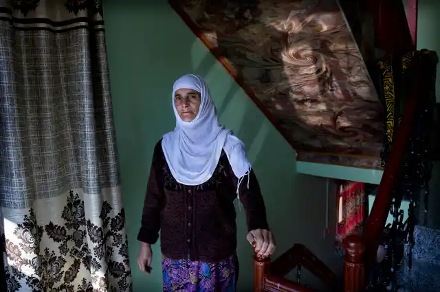Kashmiri woman Biba Malla inside her house on the outskirts of Srinagar, 14 October 2019