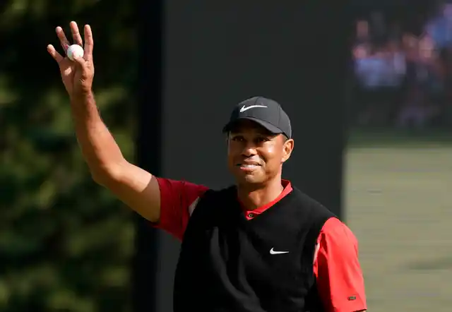 Tiger Woods reacts after his putt on the 18th hole during the final round of the Zozo Championship PGA Tour at the Accordia Golf Narashino country club in Inzai, east of Tokyo, Japan.